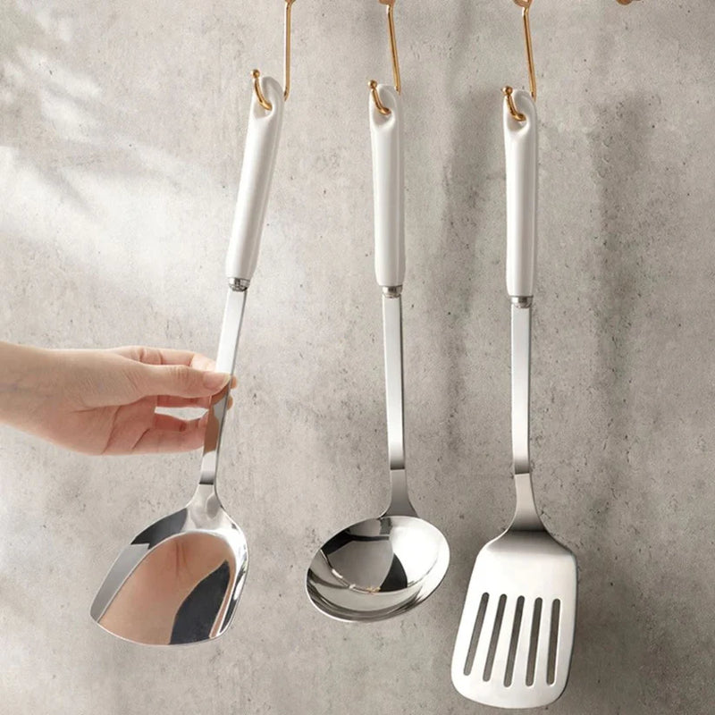 Kit de Utensílios de Cozinha em Aço Inox com Cabo de Cerâmica – 7 Peças